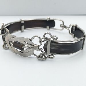 Metal and horn silver tone bracelet